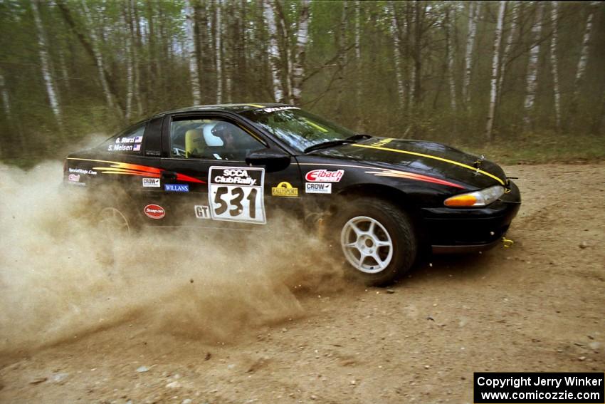 Steve Nielsen / Garrett Sturzl drift their Plymoth Laser through a 90-right on Indian Creek Rd., SS1.