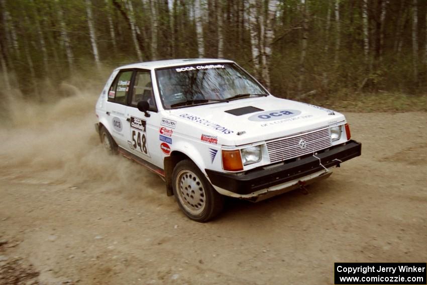 John Zoerner / John Shepski drift their Dodge Omni GLH Turbo through a 90-right on Indian Creek Rd., SS1.