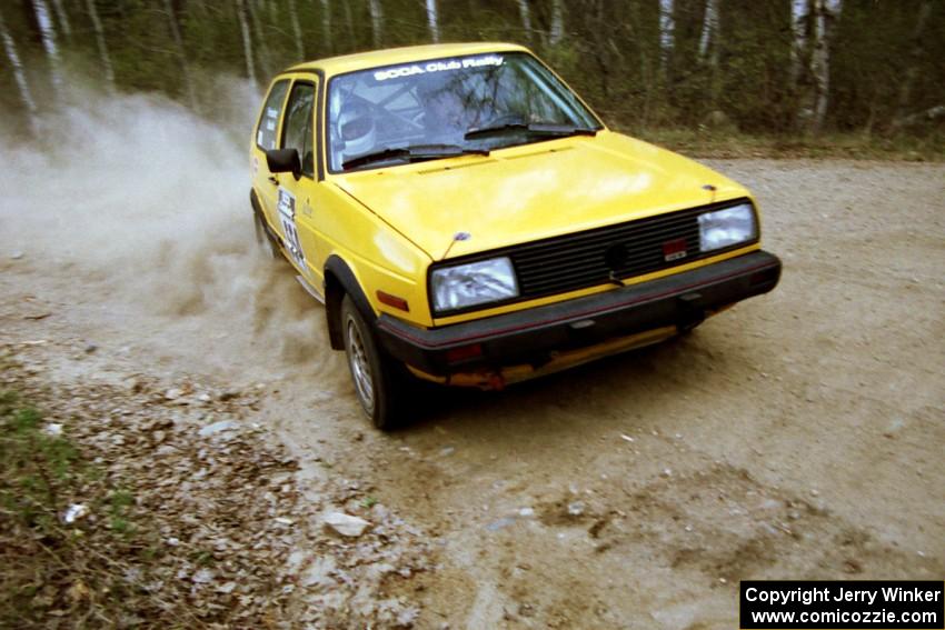 Mark Buskirk / Paul Fernandez drift their VW GTI through a 90-right on Indian Creek Rd., SS1.