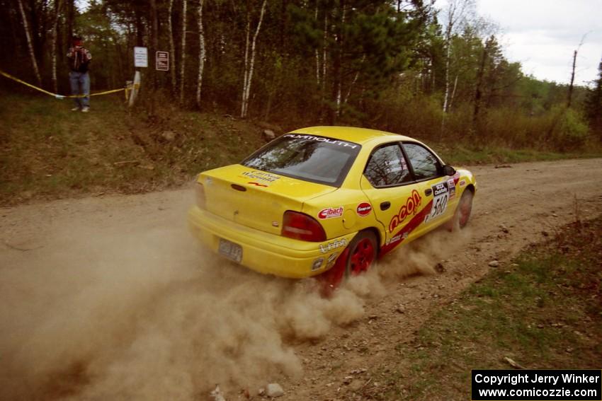 Dave Johnson / Shannon Johnson come out of a 90-right on Indian creek Rd., SS1, in their Dodge Neon ACR.