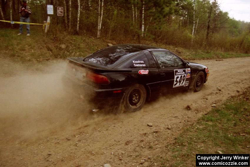 Thanasi Samaras / Constantine Koutras drift their Eagle Talon out of a 90-right on Indian Creek Rd., SS1.