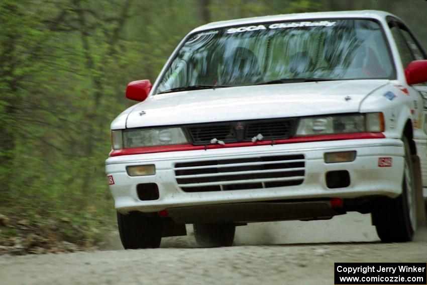 Todd Jarvey / Rich Faber at speed in the Two Inlets State Forest in their Mitsubishi Galant VR-4.