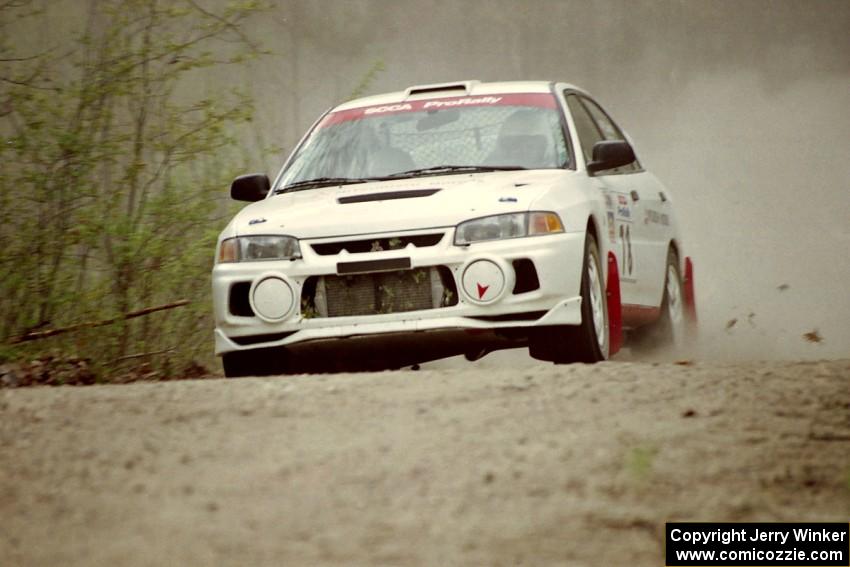 Paul Dunn / Rebecca Dunn at speed in the Two Inlets State Forest in their Mitsubishi Lancer Evo IV.