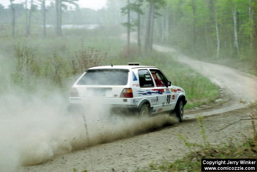 Bob Nielsen / Ed Wahl at speed in the Two Inlets State Forest in their VW GTI.
