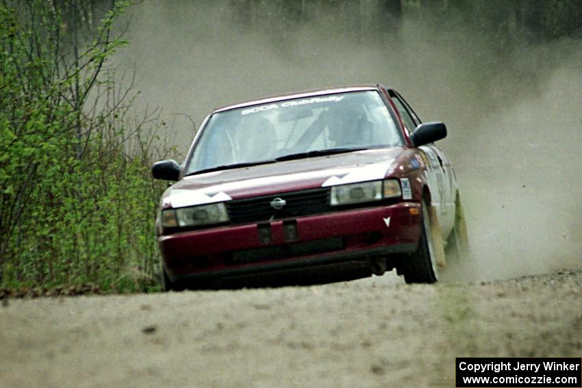 Eric Seppanen / Jake Himes at speed in the Two Inlets State Forest in their Nissan Sentra SE-R.