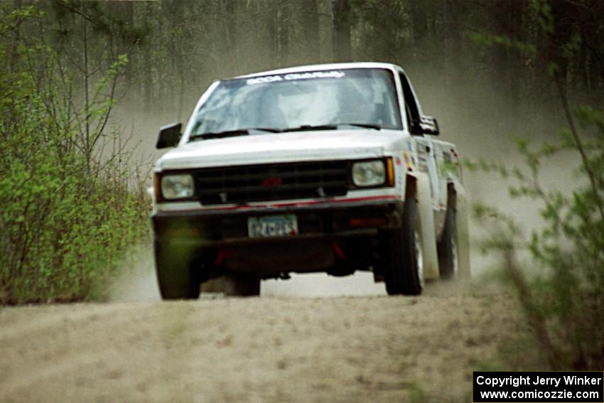 Jim Cox / Kaari Cox were still at speed in the Two Inlets State Forest in their Chevy S-10 Pickup even after rolling.