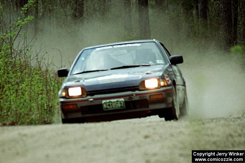Pete Mathewson / Susan Mathewson at speed in the Two Inlets State Forest in their Honda CRX.