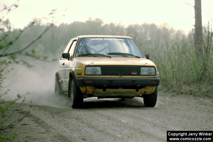 Mark Buskirk / Paul Fernandez at speed in the Two Inlets State Forest in their VW GTI.