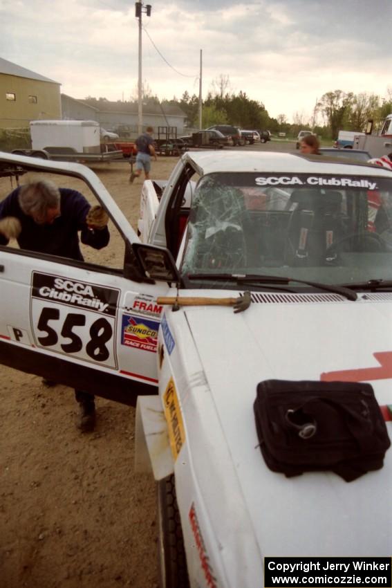Work is performed at service on the Jim Cox / Kaari Cox Chevy S-10 Pickup after rolling early in the event.