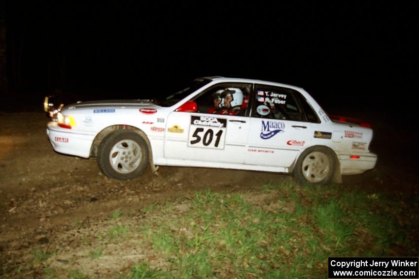 Todd Jarvey / Rich Faber head uphill at the crossroads hairpin in their Mitsubishi Galant VR-4.