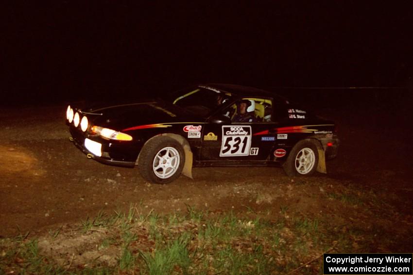 Steve Nielsen / Garrett Sturzl head uphill at the crossroads hairpin in their Plymoth Laser.