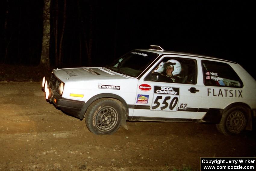 Aaron Hatz / Brendan Higgins head uphill at the crossroads hairpin in their VW GTI.