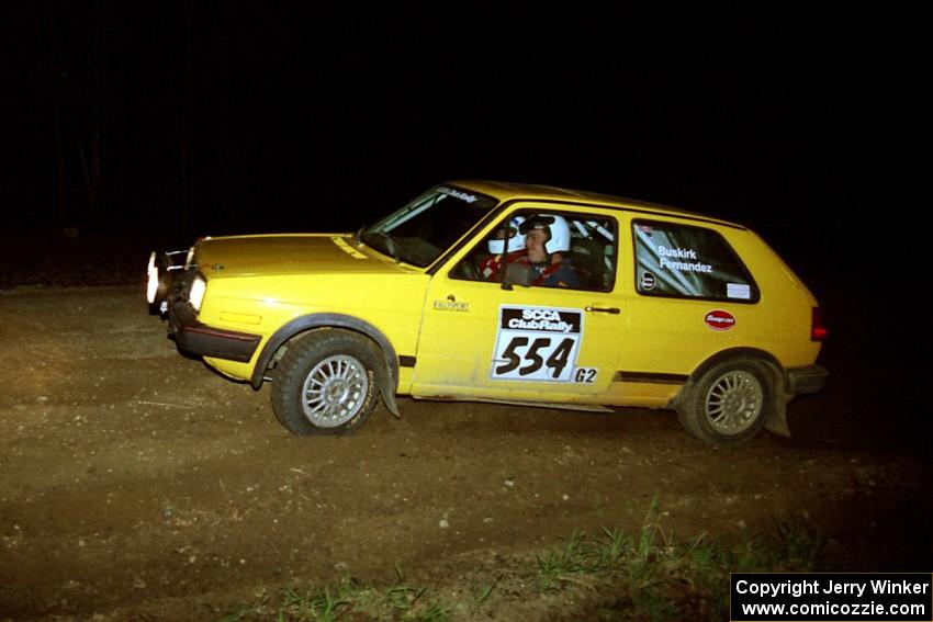 Mark Buskirk / Paul Fernandez head uphill at the crossroads hairpin in their VW GTI.