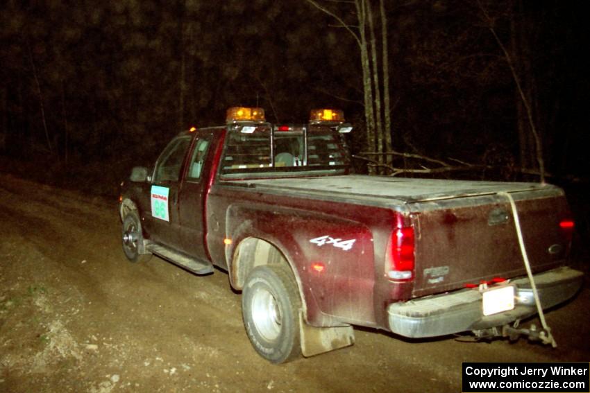 One of the sweep trucks heads uphill at the crossroads hairpin.