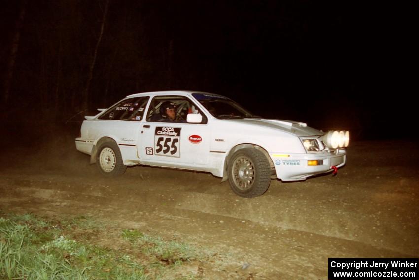 Colin McCleery / Jeff Secor drift their Merkur XR4Ti through the crossroads sweeper on the final stage of the rally.