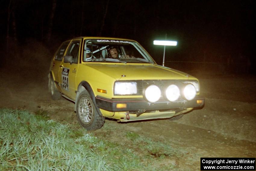 Mark Buskirk / Paul Fernandez drift their VW GTI at the crossroads on the final stage of the night.