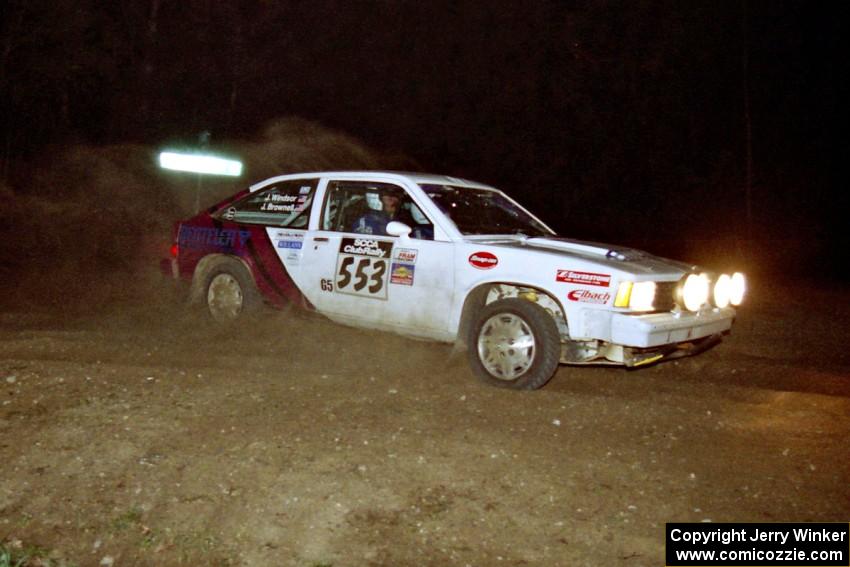 Jerry Brownell / Jim Windsor drift their Chevy Citation through the crossroads on the final stage of the rally.
