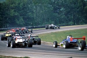 Elton Julian leads the field through turn one.