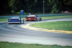 Tommy Archer's Dodge Daytona ahead of Wally Owens' Ford Mustang