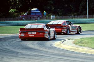 Tommy Archer leads Bobby Archer, both in Dodge Daytonas