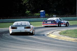 George Robinson's Chevy Camaro ahead of Deborah Gregg's Chevy Camaro