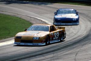 Scott Sharp's Chevy Camaro and Jack Baldwin's Chevy Camaro