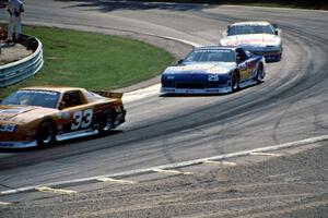 Scott Sharp's Chevy Camaro, Jack Baldwin's Chevy Camaro and Greg Pickett's Chevy Camaro