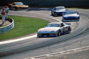 Greg Pickett's Chevy Camaro, Jack Baldwin's Chevy Camaro, Ron Fellows' Ford Mustang and Scott Sharp's Chevy Camaro