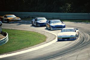 Greg Pickett's Chevy Camaro, Jack Baldwin's Chevy Camaro, Ron Fellows' Ford Mustang and Scott Sharp's Chevy Camaro