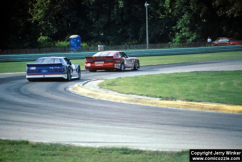 Tommy Archer's Dodge Daytona ahead of Wally Owens' Ford Mustang