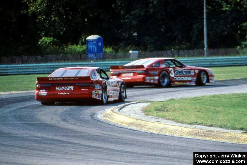 Tommy Archer leads Bobby Archer, both in Dodge Daytonas