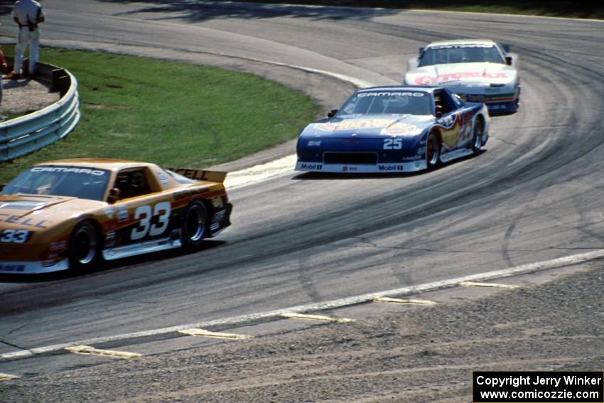 Scott Sharp's Chevy Camaro, Jack Baldwin's Chevy Camaro and Greg Pickett's Chevy Camaro