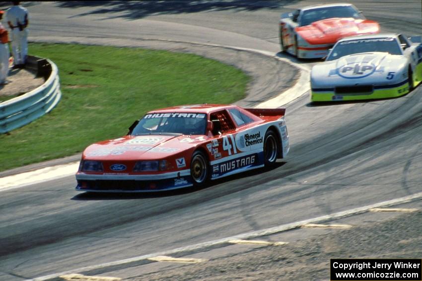 Michael Dingman's Ford Mustang, Randy Ruhlman's Chevy Camaro and Deborah Gregg's Chevy Camaro