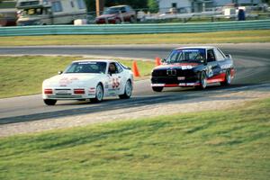 Greg Theiss' Porsche 944 S2 and Kermit Upton III's BMW M3