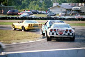 Kim Baker's Chevy Corvette leads Boris Said III's Ford Saleen Mustang SC and R.K. Smith's Chevy Corvette