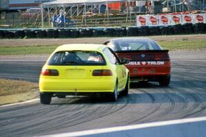 Oscar Peralta's Eagle Talon ES and Forrest Granlund's Honda Civic Si