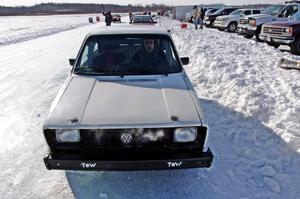 Brad Johnson pulls his VW Rabbit into the pits after a sprint race.