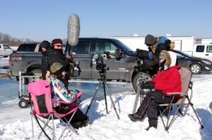 Morgan Johnson is interviewed by a camera crew