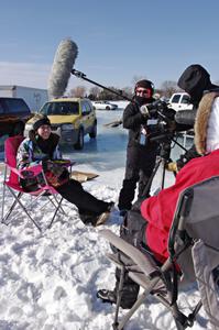 Morgan Johnson is interviewed by a camera crew