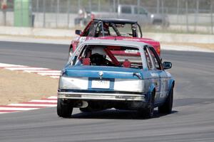 North Loop Motorsport BMW 325 chases Missing Link Motorsports BMW 325i