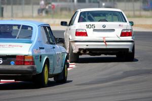 Team LMR BMW 325i and Fart-Hinder Racing SAAB 900S