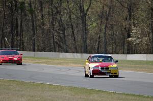 Tubby Butterman Racing 1 BMW 325i and Braunschweig Racing Chevy Corvette