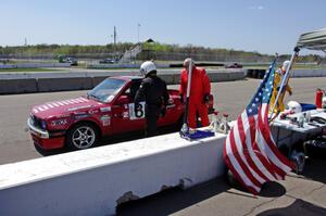 Missing Link Motorsports BMW 325i in the pits during a driver's change.