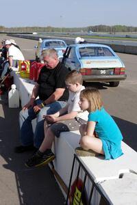 Tim Winker with his nephew and niece on the pit wall.