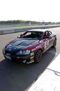 Left Shark Racing Hyundai Tiburon after the race