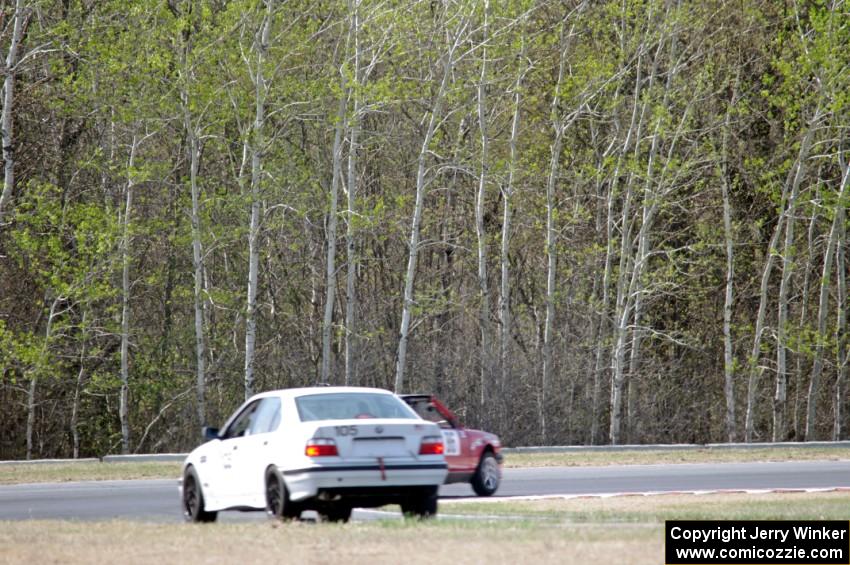 Team LMR BMW 325i follows Missing Link Motorsports BMW 325i