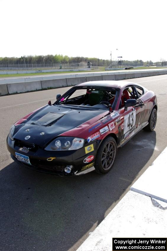 Left Shark Racing Hyundai Tiburon after the race