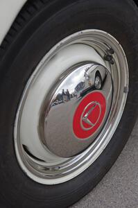 Volvo P1800 in a 544 hubcap