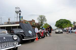 Triumphs and a Mercedes-Benz