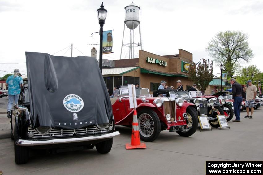 Triumph TR-4 and various MGs